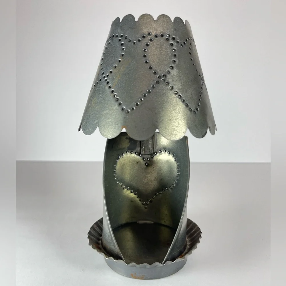 Vintage punched tin tea light candle holder